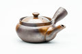 Japanese Kyusu - Ash Glazed Banko-yaki Mesh Teapot - 230ml - three-quarter front view, lid on, spout to the left and side handle to the right, brown-grey ash glaze