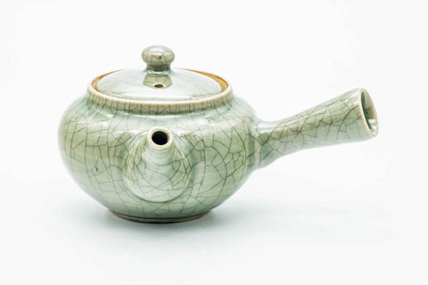 Green celadon Obori Soma kyusu, three-quarter view from the rear with the spout to the right