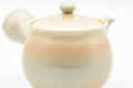 Tezumi — Japanese Kyusu - Beige Pink Glazed Hagi-yaki Do-ake Teapot - 220ml — closeup of the base