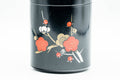 Japanese Chazutsu - Floral Black Lacquer Tea Canister - 200ml - front view of the floral plum design