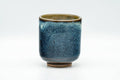 Tezumi — Japanese Teacup - Black and Blue Glazed Tsutsu-gata Yunomi - 140ml — front view from another angle