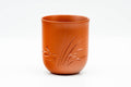 Japanese Teacup - Long Grass Engraved Tokoname-yaki Yunomi - 120ml - front view showing the engraved grass motif