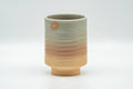 Tezumi — Japanese Teacup - Beige Pink Spiraling Hagi-yaki Yunomi - 160ml — front view from another angle