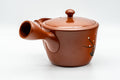Tezumi — Japanese Kyusu - Plum Blossom Engraved Tokoname-yaki Mesh Teapot - 300ml — top-down view of the lid