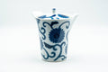 Tezumi — Japanese Kyusu - Blue Floral Arita-yaki Porcelain Debeso Teapot - 300ml — side view with the lid and side handle