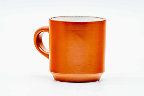 Side view of the handled cup with the handle to the left.