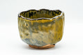 Japanese Matcha Bowl - Black and Yellow Undulating Wabi-Sabi Chawan - 450ml - three-quarter view showing the wavy rim