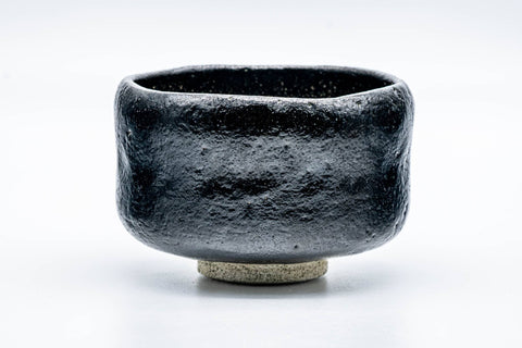 Opposite side showing the black glaze and cream foot