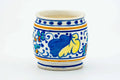 Front view of the cylindrical futaoki with blue and yellow floral painting on a white ground.