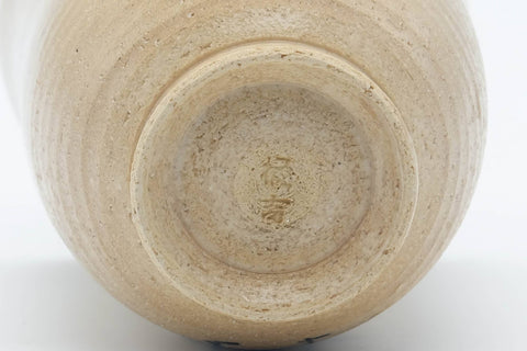 Tezumi — Japanese Teacup - Beige Glazed Egrets Tulip Yunomi - 130ml — closeup of the glaze