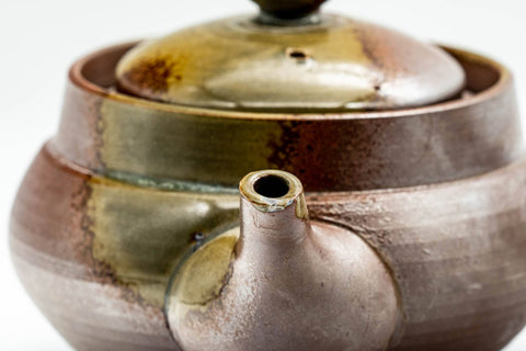 Overhead view of the spout and shoulder of the pot.