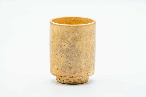 Teacup from another angle, showing the glaze wrapping around the body.