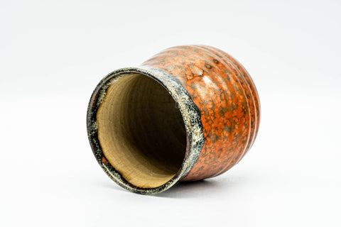 Japanese Teacup - Red Speckled Hare's Fur Glazed Yunomi - tilted to show the glazed interior and rim