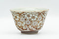 Japanese Teacup - Chrysanthemum Ume Kutani-yaki Yunomi - 120ml - front view, white cup with red and gold chrysanthemum and plum kutani pattern