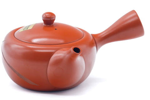 Tezumi — Japanese Kyusu - Long Grass Engraved Tokoname Mesh Teapot - 310ml — closeup of the decoration