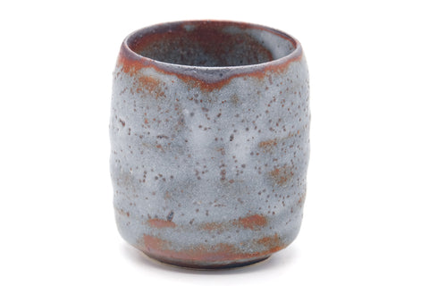 Tezumi — Japanese Teacup - Blue Shino Glazed Mino Yunomi - 100ml — tipped to show the interior