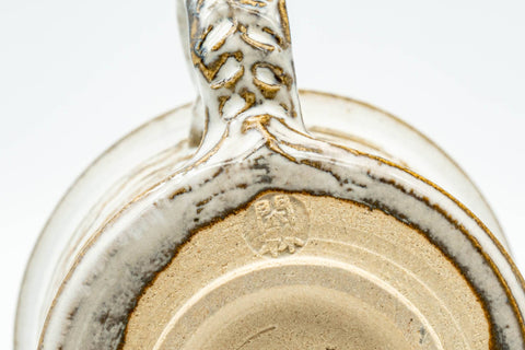 Tezumi — Japanese Teacup - Carved Exterior White Glazed Rear-Handled Ushirode Yunomi - 110ml — closeup of the glaze
