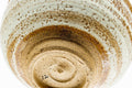 Overhead closeup looking into the interior showing the spiral throwing rings