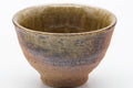 Tezumi — Japanese Teacup - Brown Green Ash Glazed Shigaraki-yaki Yunomi - 110ml — tipped to show the interior