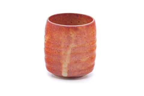 Tezumi — Japanese Teacup - Orange Shino Glazed Mino Yunomi - 100ml — tipped to show the interior