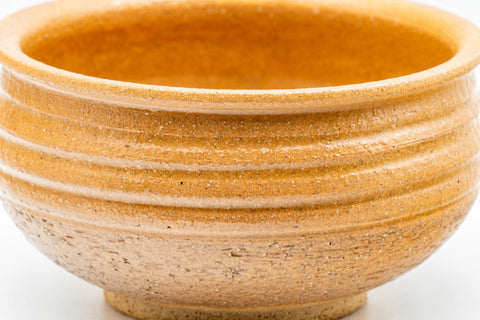 Tezumi — Japanese Kensui - 赤膚山 Akahada-yaki - Beige Spiraling Water Bowl - 550ml — tipped to show the interior