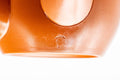Tezumi — Japanese Kyusu - Classic Red Shudei Tokoname-yaki Mesh Teapot - 275ml — closeup of the base