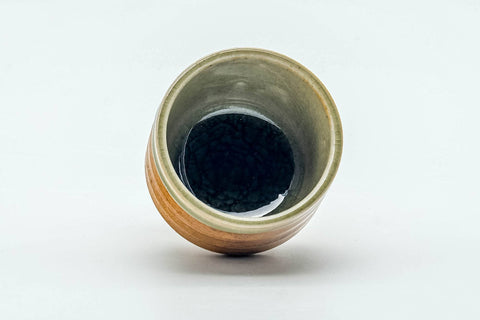 Tezumi — Japanese Teacup - Orange Green Spiraling Shigaraki-yaki Guinomi - 30ml — three-quarter view