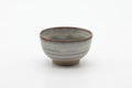 Tezumi — Japanese Teacup - Grey Milky Glazed Spiraling Yunomi - 130ml — front view from another angle