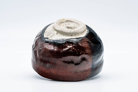 Tezumi — Japanese Matcha Bowl - Black Red Glazed Kuro-Raku Chawan - 300ml — closeup of the glaze