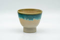 Tezumi — Japanese Teacup - Small Turquoise Drip-Glazed Agano-yaki Guinomi - 40ml — front view from another angle