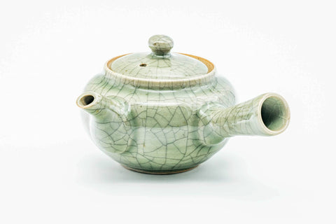 Green celadon Obori Soma kyusu, side profile with the spout to the left