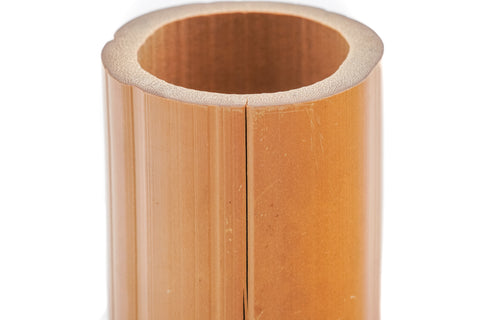 Close-up looking into the open top of the nodeless bamboo cylinder.