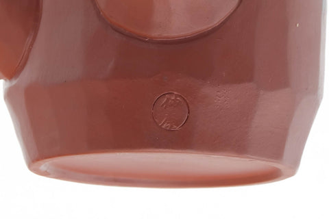 Close-up of the faceted lower body near the base.