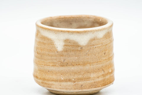 Tezumi — Japanese Teacup - Beige Drip-Glazed Hagi-yaki Yunomi - 70ml — tipped to show the interior