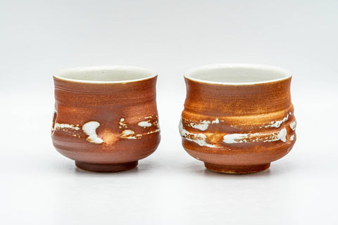Tezumi — Japanese Teacups - Pair of Orange White Textured Glazed Yunomi - 100ml — front view