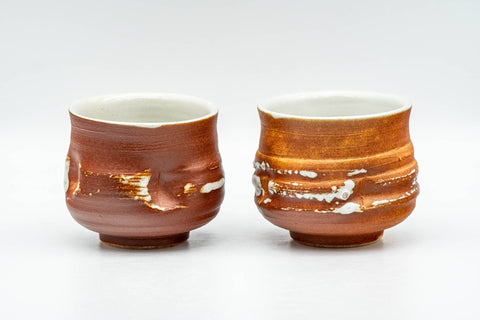 Tezumi — Japanese Teacups - Pair of Orange White Textured Glazed Yunomi - 100ml — front view from another angle