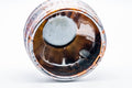 Angled interior view showing the metallic glaze and base