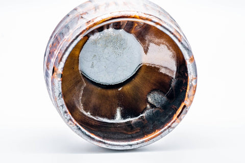 Angled interior view showing the metallic glaze and base