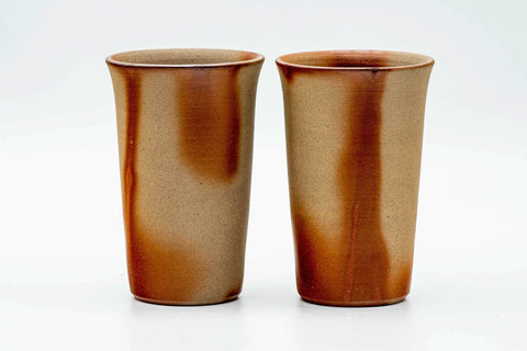 The two matching Bizen-yaki cups standing side by side, front view.