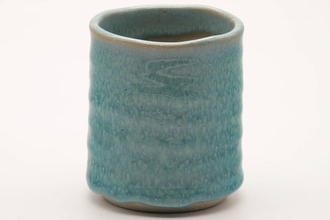 Tezumi — Japanese Teacup - Large Spiraling Teal Glazed Yunomi - 250ml — tipped to show the interior