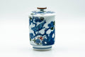 Japanese Teacup - Blue Bird Floral Arita-yaki Lidded Yunomi - 160ml - front view of the lidded cup showing the blue bird and floral motif