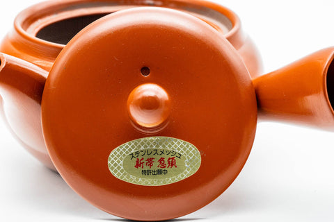 Japanese Kyusu - Red Shudei Tokoname-yaki Obi-ami Mesh Teapot - 325ml - overhead view of the body with a small maker's label