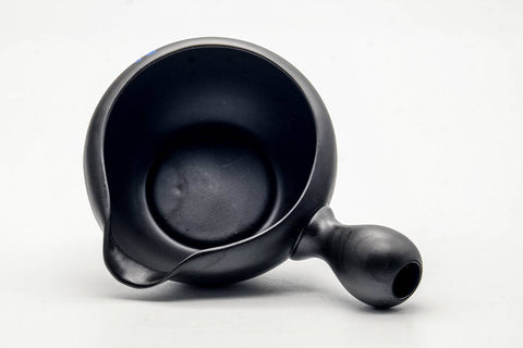 Top-down view of the black yuzamashi showing the open mouth, interior, and side handle.