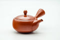 Japanese Kyusu - Classic Red Shudei Tokoname-yaki Mesh Teapot - 200ml - three-quarter front view showing the lid knob and side handle