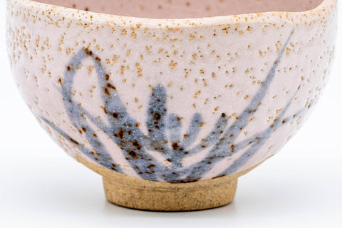 Japanese Matcha Bowl - Pink Shino Mino-yaki Chawan - 475ml - closeup front view of the painted grasses on the pink Shino glaze