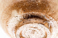 Close-up of the inverted biwa-iro Hagi chawan base, showing the spiral-trimmed foot ring