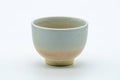 Tezumi — Japanese Teacup - 天鵬山 Tsubaki Kiln - Classic Beige Hagi-yaki Yunomi - 80ml — front view from another angle