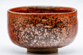 Tezumi — Japanese Matcha Bowl - Vibrant Red Oil Glazed Chawan - 250ml — closeup of the glaze