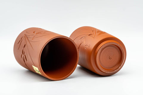 Japanese Teacups - Pair of Bamboo Engraved Tokoname-yaki Meoto Yunomi - both cups lying on their sides showing the interiors