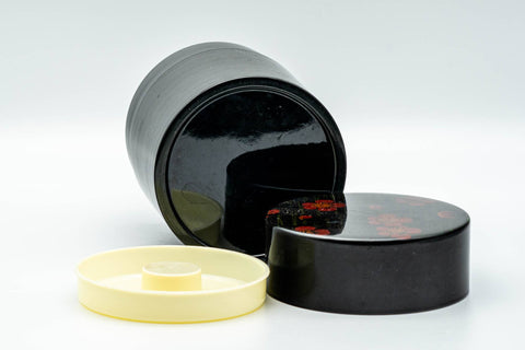 Tezumi — Japanese Chazutsu - Red Blossoms Black Plastic Tea Canister - 300ml — closeup of the finish